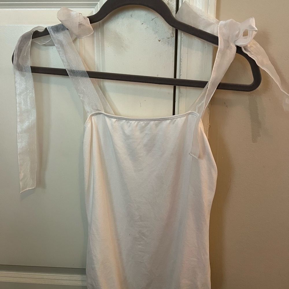 White bodysuit with sheer sleeves
